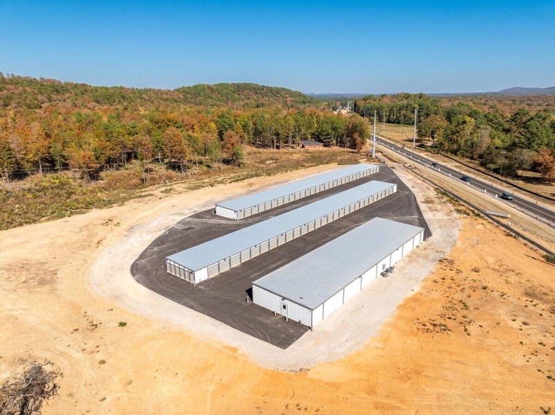 Aerial view of Mountain Storage facility with three buildings and mountain backdrop, Hot Springs, Arkansas